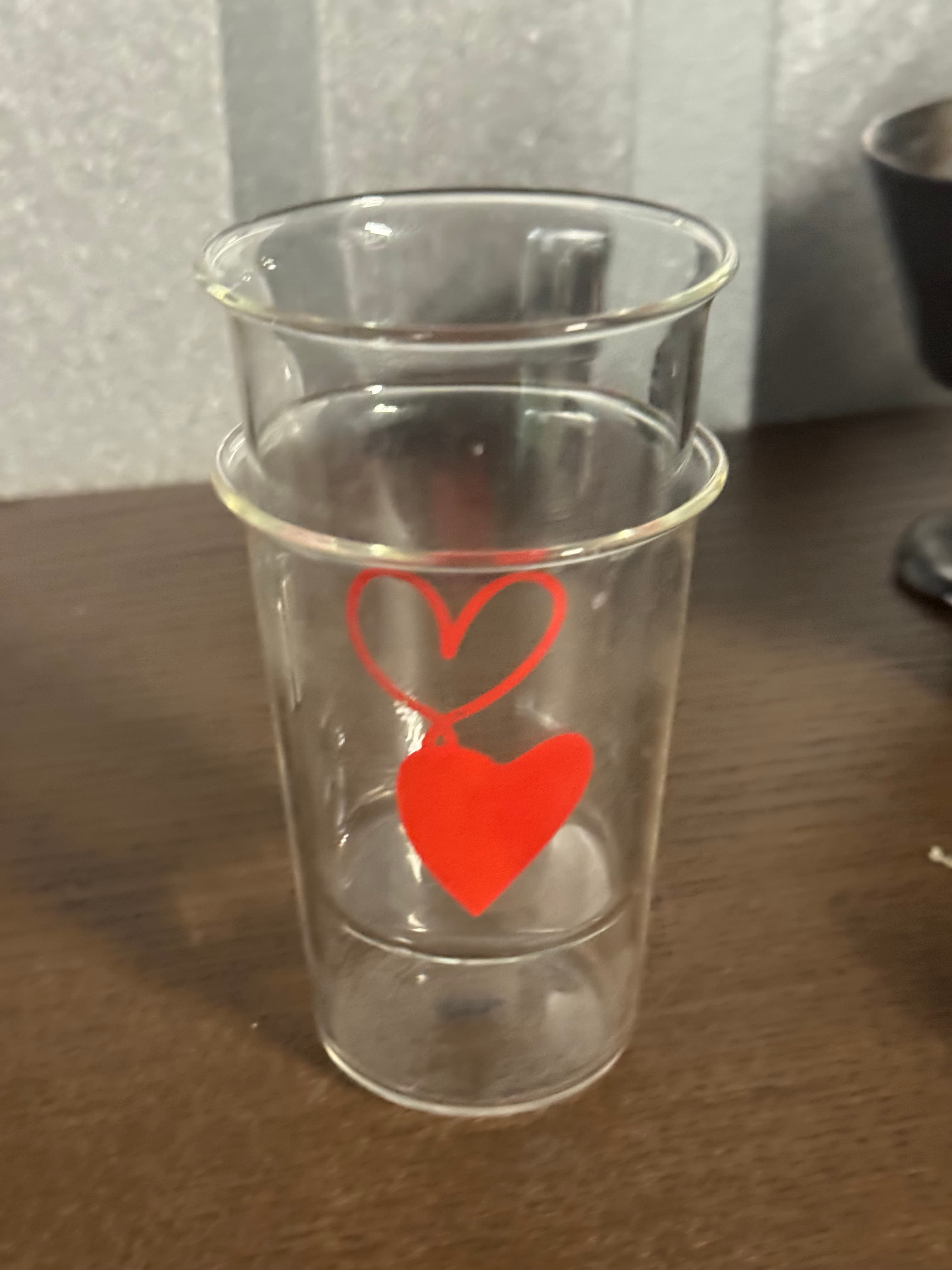 Transparent Glass Cup with Heart Design