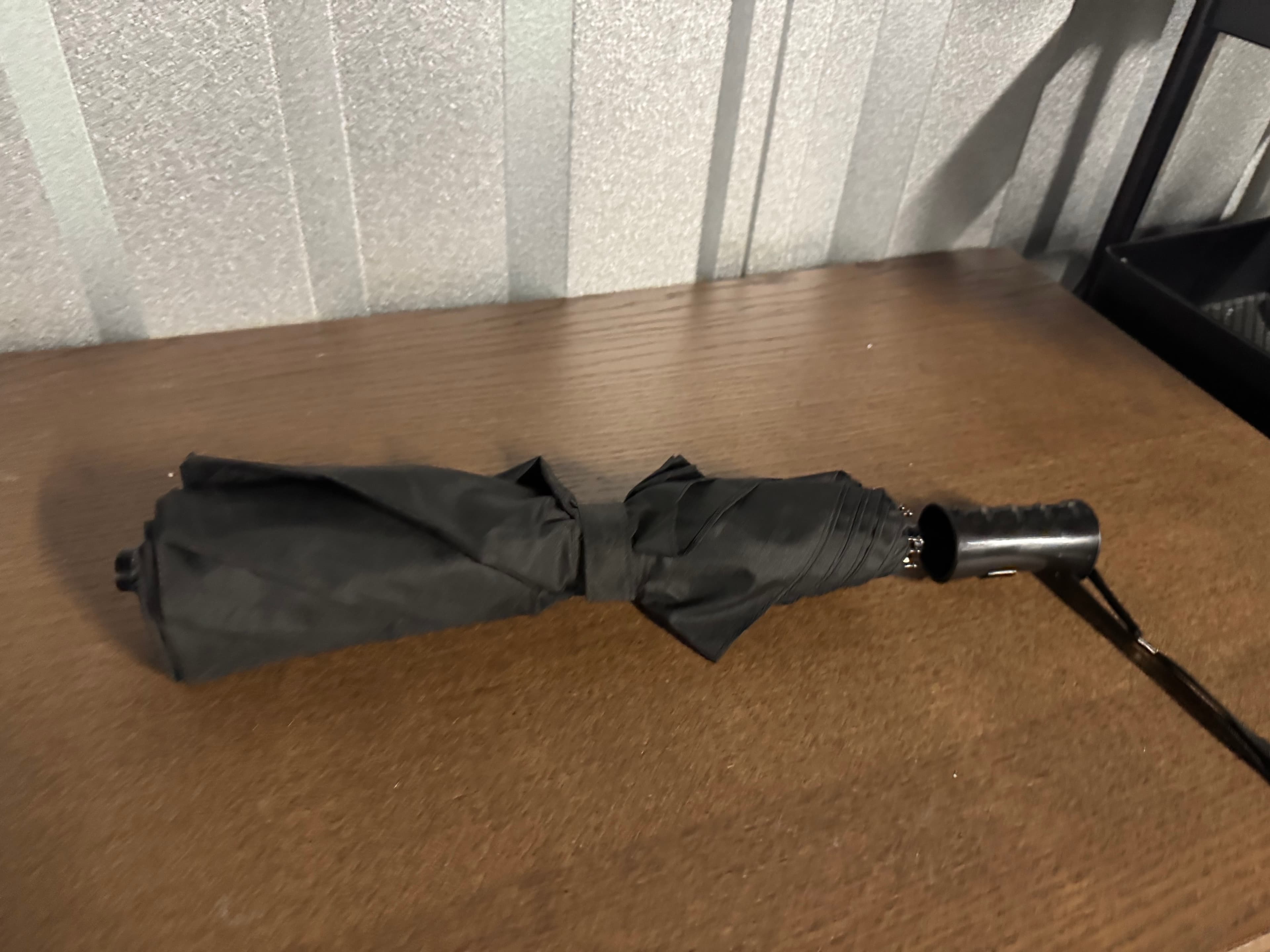 Black folding umbrella